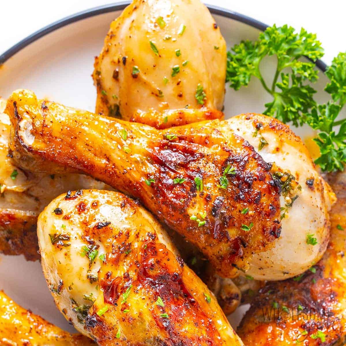 Juicy and crispy air fryer chicken legs close up