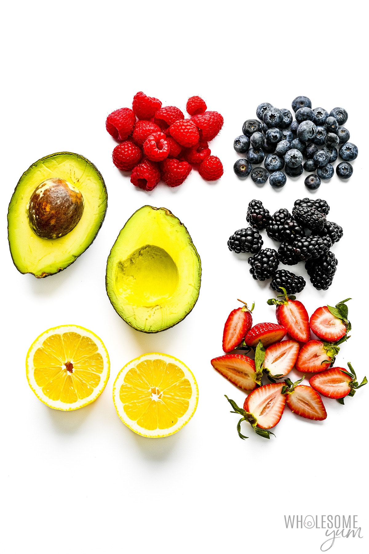 Low carb fruits on white background.