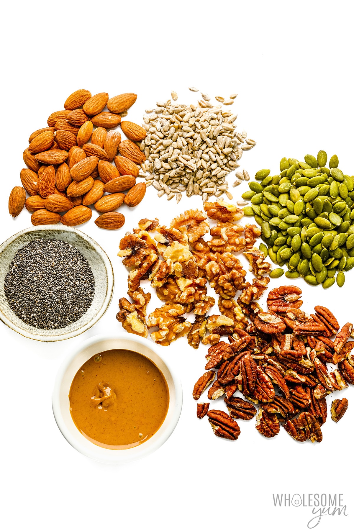 Low carb nuts on white background.
