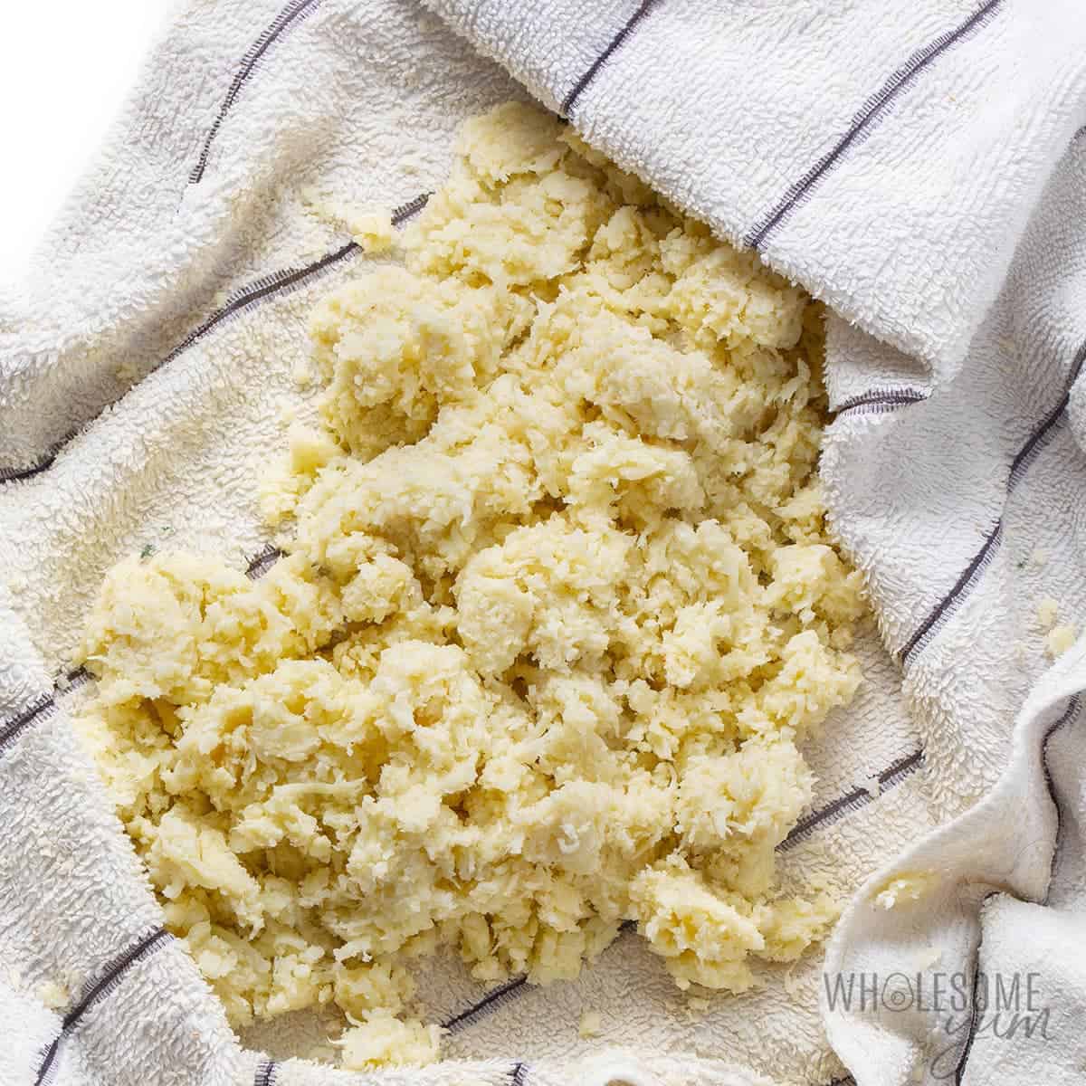 Moisture squeezed out in kitchen towel.