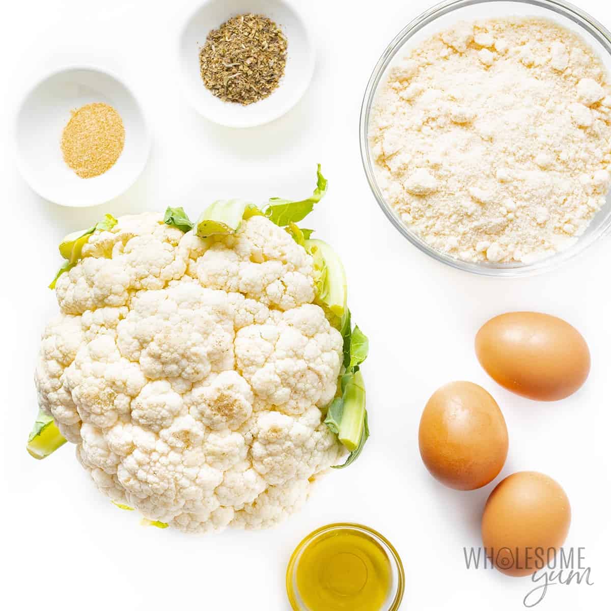 Cauliflower pizza crust recipe ingredients in bowls.