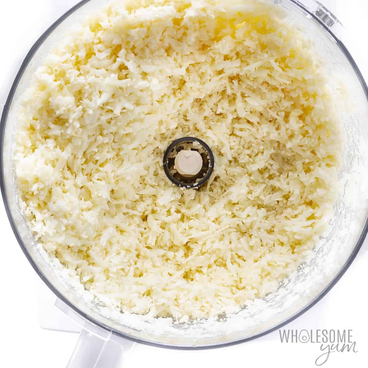 Cauliflower rice in food processor.