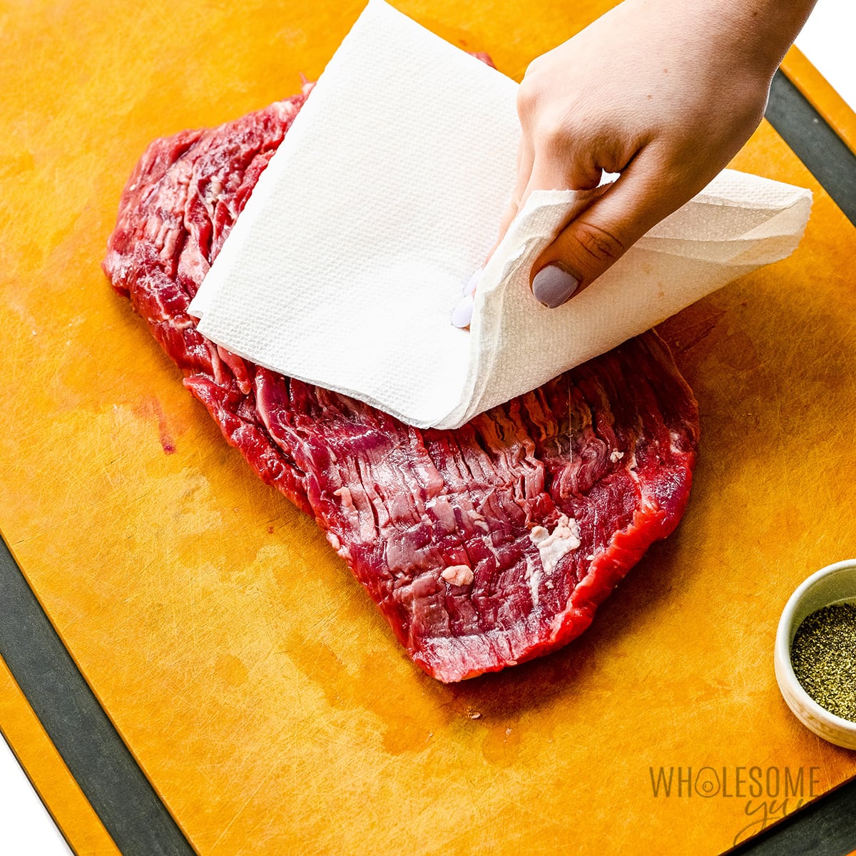 Steak patted dry with paper towels.