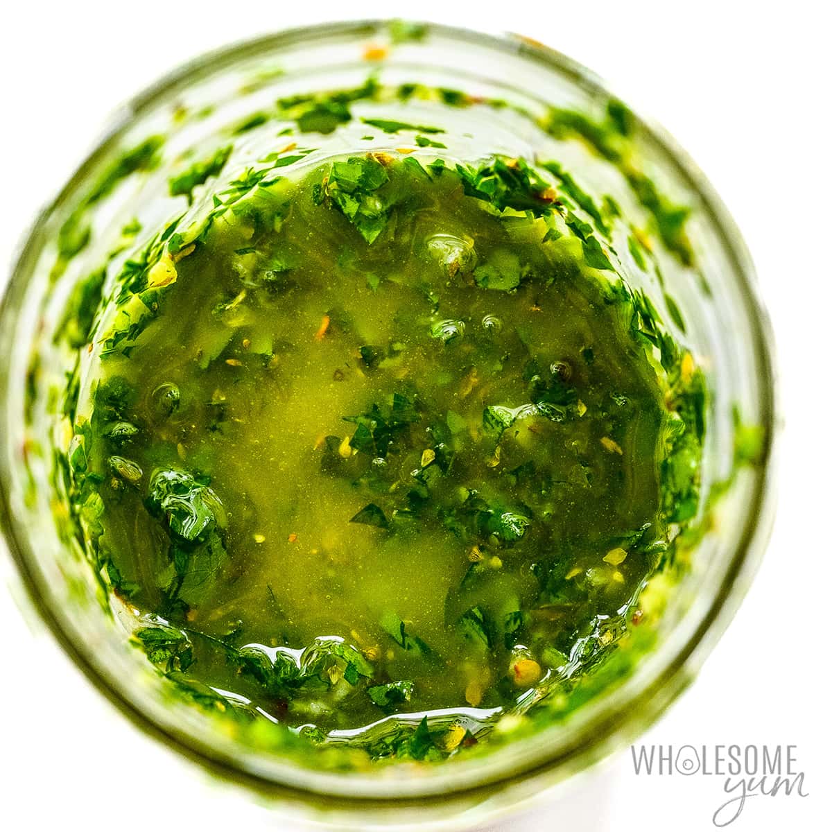 Chimichurri sauce in a jar.