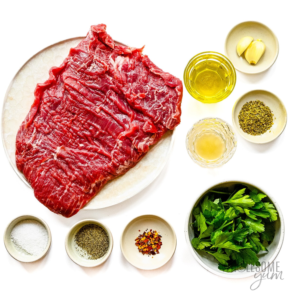 Chimichurri steak recipe ingredients measured out in bowls.