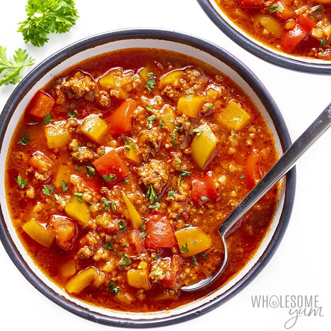 Bowl of stuffed pepper soup with spoon