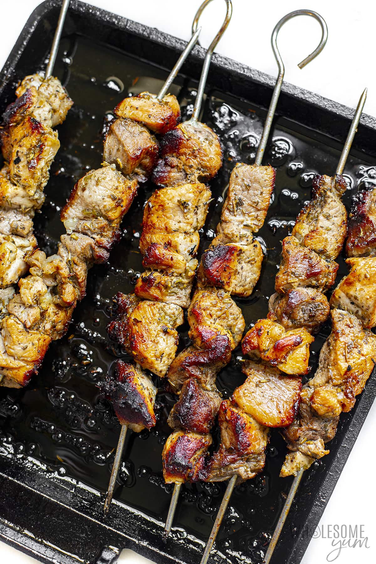 Greek souvlaki on a pan.