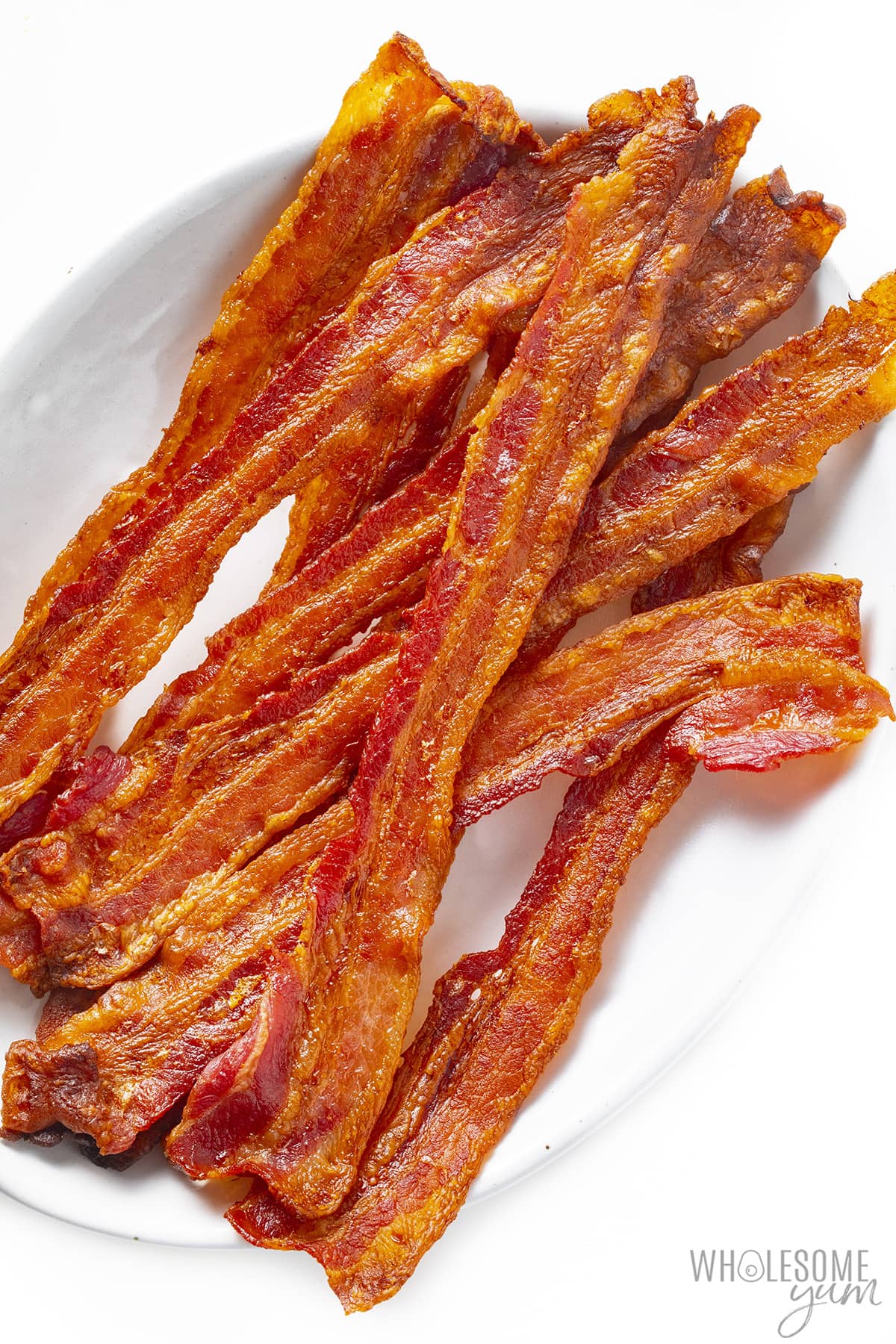 Crispy oven bacon on a plate.