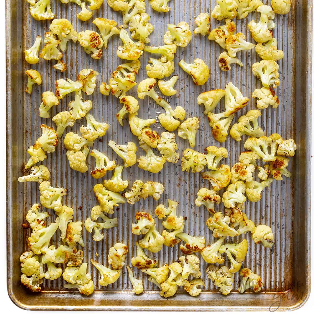 Cauliflower roasted on sheet pan.